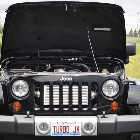 Black JK Jeep Wrangler with hood open