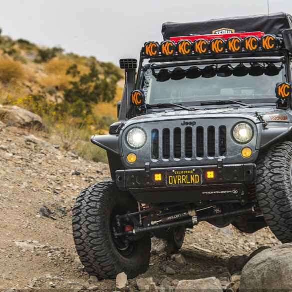 Grey Jeep offroading outdoors